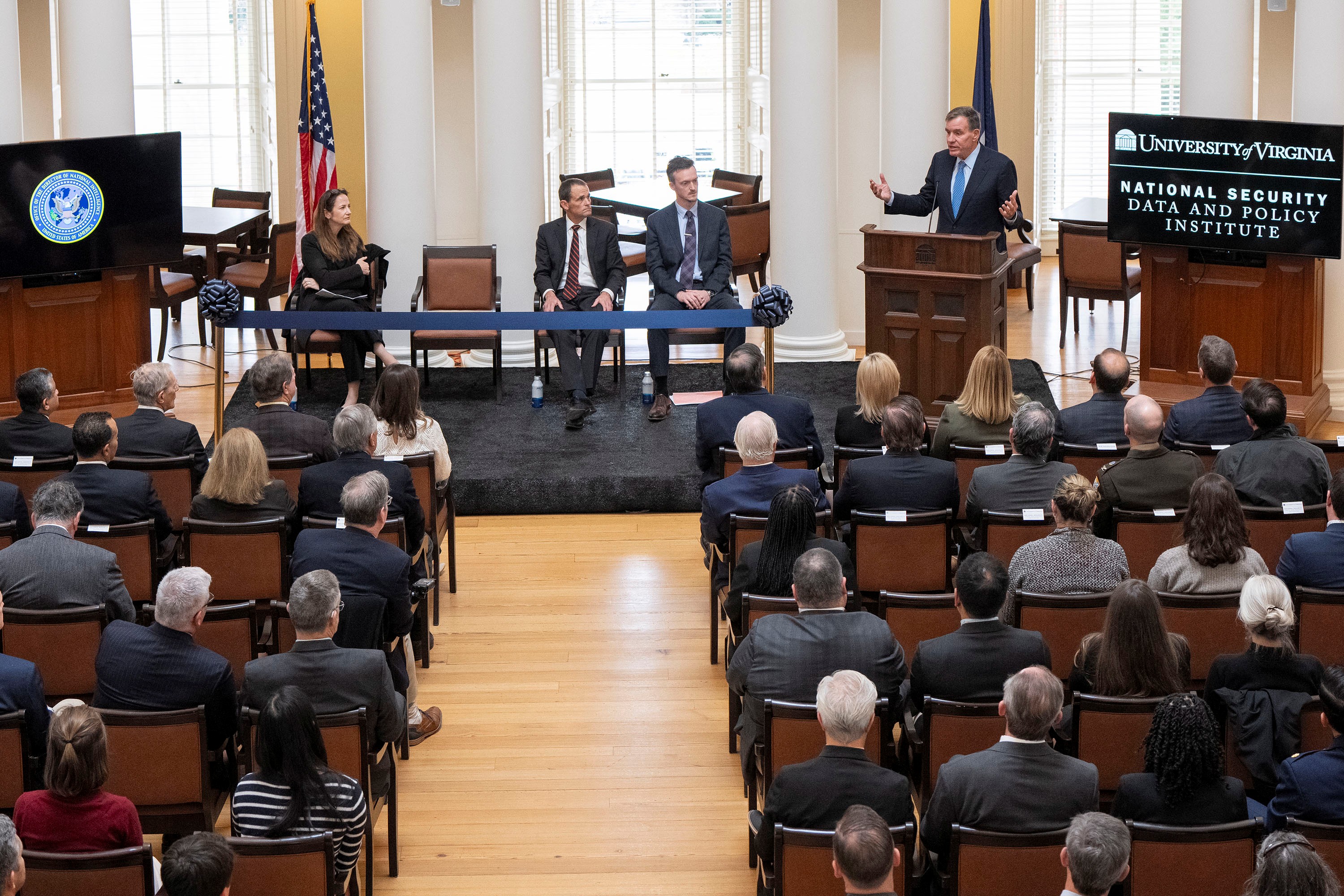 Audience listens to Sen. Mark Warner's remarks at NSDPI Ribbon Cutting